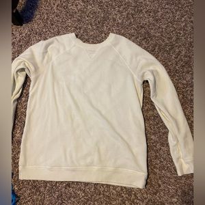 light yellow/cream colored crewneck